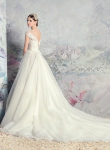 Style #1631L, tulle ball gown wedding dress with pleated bodice and lace accents, available in ivory