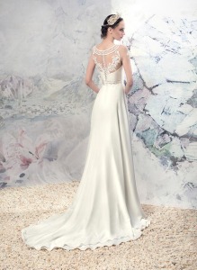 Style #1634L, A-line wedding gown with embroidered illusion neckline, available in ivory