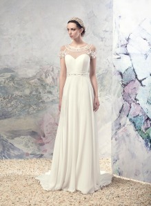 Style #1634L, A-line wedding gown with embroidered illusion neckline, available in ivory