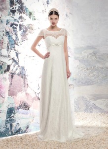 Style #1652LS, lace sheath wedding gown with cap sleeves and plunging back, available in ivory