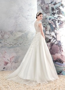Style #1658, organza A-line wedding dress with lace bodice and cap sleeves, available in ivory