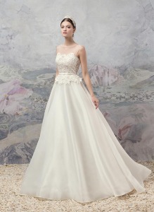 Style #1662, A-line wedding dress with an illusion neckline lace bodice, available in ivory
