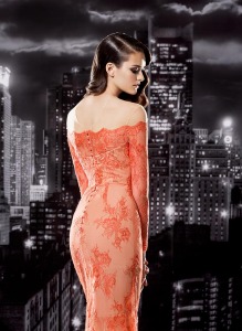 Style #110, long sleeve off the shoulder mermaid style lace dress. Mesh top to hold up the dress, available in orange, cool blue and black