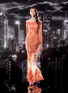 Style #110, long sleeve off the shoulder mermaid style lace dress. Mesh top to hold up the dress, available in orange, cool blue and black