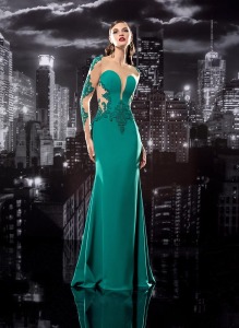 Style #112, plunging neckline floor length dress. Sheer long sleeves with embellishments and along the sides through the middle, available in black, blue, milk, pink-ivory, green, light blue and red