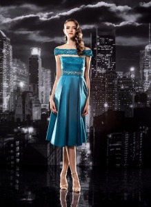 Style #120, off the shoulders cocktail dress, slits revealing between chest and waist, with mesh overlay decorated with embellishment lace, available in cool blue