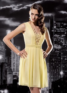 Style #123, v-neck cocktail dress with pleated top and flower embellishment covering the v-neck, available in milk, white, cornflower-blue, mint, grey, yellow, green, red, black, lilac, pink, pink-ivory, peach, berry and cool blue