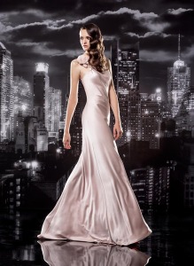 Style #125, sheath style spaghetti strap floor-length dress with a handmade rose on one strap, available in milk, nude, black, blue, green, light blue, red and white
