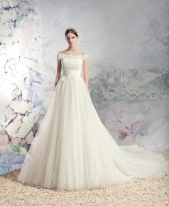 Style #1631L, tulle ball gown wedding dress with pleated bodice and lace accents, available in cream