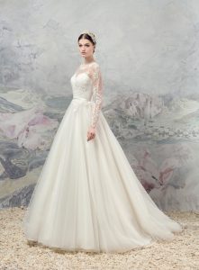 Style #1660, ball gown wedding dress with illusion lace neckline and sleeves, available in cream