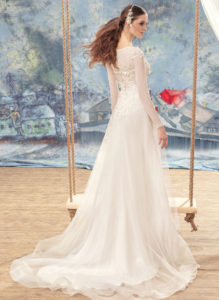 Style #1701L, A-line wedding dress with 3-D floral embroidery, and long chiffon sleeves, available in ivory