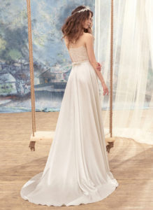 Style #1703L, empire waist A-line wedding dress with 3-D floral embroidered bodice, available in ivory, ivory-pink (photo)
