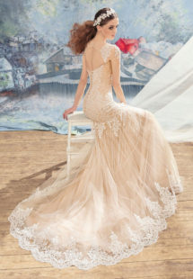 Style #1704L, beaded lace fit and flare wedding dress with an illusion neckline and long sleeves, available in nude (photo), ivory