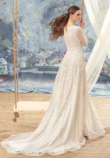 Style #1705L, long sleeve A-line wedding gown with lace appliques and embroidery, available in ivory