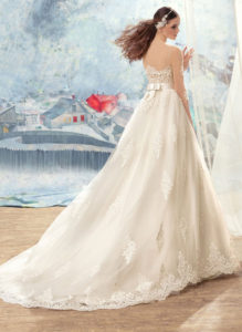 Style #1707L, spaghetti strap ball gown wedding dress with beaded lace bodice and lace appliques down the skirt; comes with a separate 3/4 sleeve illusion lace bolero, available in ivory (with nude cup), ivory (with ivory cup)