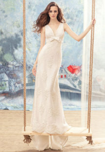 Style #1708L, beaded lace sheath wedding dress with bow detail on the plunging neckline top, available in ivory