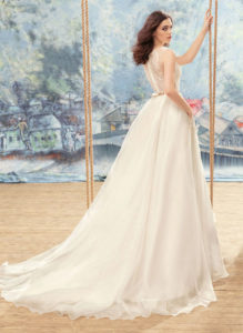 Style #1711L, illusion neckline organza ball gown wedding dress with lace back, jeweled blush belt and side pockets, available in ivory