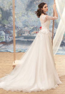 Style #1716L, tulle A-line wedding gown with illusion lace sleeves and beaded bodice, available in white-ivory