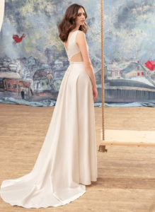 Style #1719L, sheath wedding dress with illusion side cutouts and beaded flower applique, available in ivory