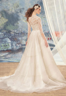 Style #1720L, beaded lace ball gown wedding dress with 3/4 length illusion sleeves and tiered skirt, available in ivory