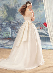 Style #1722L, stripe detail ball gown wedding dress with illusion neckline, short sleeves and hand-made flower decor, available in ivory