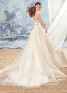 Style #1723L, beaded lace bustier bodice ball gown wedding dress with tulle skirt and satin bow belt, available in ivory (with ivory cup - photo), ivory (with nude cup)