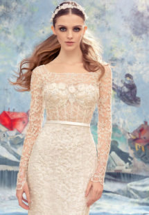 Style #1727L, fitted lace wedding gown with sheer lace bodice with long sleeves, available in ivory