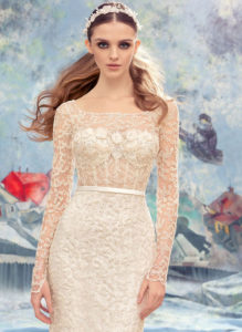 Style #1727L, fitted lace wedding gown with sheer lace bodice with long sleeves, available in ivory