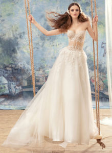 Style #1737L, ball gown wedding dress with sheer lace bustier bodice and tulle skirt, available in ivory (with ivory bodice ), ivory (with nude bodice)