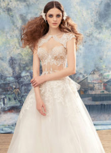 Style #1737L, ball gown wedding dress with sheer lace bustier bodice and tulle skirt; comes with a cap sleeve lace bolero, available in ivory (with ivory bodice ), ivory (with nude bodice)