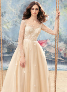 Style #1742L, tulle A-line wedding dress with sheer lace bodice, long sleeves and 3-D flower embroidery, available in white, white-ivory, ivory, nude (photo), ivory (with nude bodice)