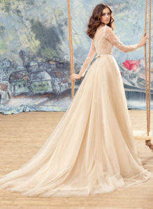 Style #1742L, tulle A-line wedding dress with sheer lace bodice, long sleeves and 3-D flower embroidery, available in white, white-ivory, ivory, nude (photo), ivory (with nude bodice)