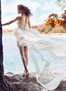 Style #1744, short lace wedding dress with the detachable long organza train, available in ivory on the nude base (photo), ivory