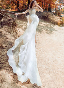 Style #1744, short lace wedding dress with the detachable long organza train, available in ivory on the nude base (photo), ivory