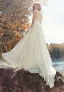 Style #1745L, A-line wedding dress with lace illusion neckline and long sleeves, available in ivory (with ivory bodice), ivory (with nude bodice - photo)