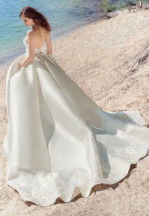 Style #1747L, strapless Mikado ball gown wedding dress with lace details and side pockets, available in white, ivory