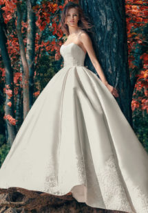 Style #1747L, strapless Mikado ball gown wedding dress with lace details and side pockets, available in white, ivory