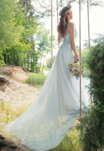 Style #1750L, A-line tulle wedding gown with loose beaded lace bodice, available in sky blue