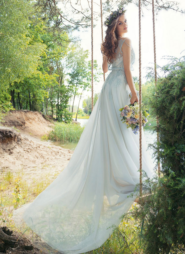 Style #1750L, A-line tulle wedding gown with loose beaded lace bodice, available in sky blue