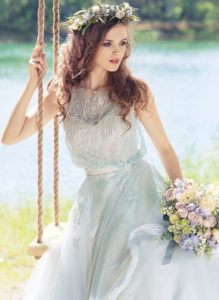 Style #1750L, A-line tulle wedding gown with loose beaded lace bodice, available in sky blue