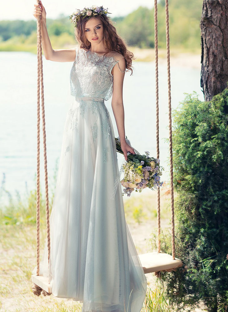 Style #1750L, A-line tulle wedding gown with loose beaded lace bodice, available in sky blue