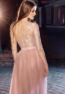 Style #207, short fitted lace dress with illusion 3/4 sleeves and detachable skirt with a rose accent, available in pink-ivory, ivory, black, cool blue