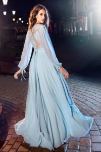 Style #215, floor length evening gown with loose long sleeves and illusion top with lace embroidery down the skirt, available in light mint