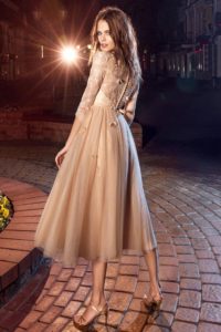 Style #216, tea length A-line cocktail dress with illusion high neckline, 3/4 length sleeves and 3D flower embroidery, available in cornflower-blue, nude and green