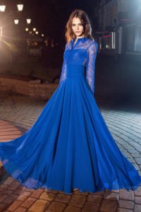 Style #220, long sleeve evening gown features lace button up top with a floor length flowy skirt, available in cornflower-blue, nude, dark green