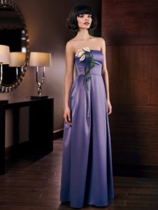 Style #300, strapless sheath style evening gown with handmade 3-D flower décor and side pockets, available in tanzanite, gray, black, purple and eggplant