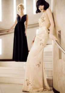 Style #316, embellished top evening gown with deep plunging neckline and accentuated natural waistline, available in black and ivory; Style #324, sleeveless v-neck evening dress with embroidered flower decor and illusion back, available in gold