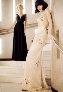 Style #316, embellished top evening gown with deep plunging neckline and accentuated natural waistline, available in ivory; Style #324, sleeveless v-neck evening dress with embroidered flower decor and illusion back, available in gold