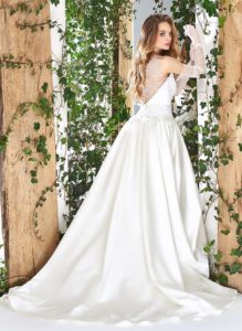 Style #1800L, satin ball gown wedding dress, designed with illusion plunging neckline, low back, and sequined lace embroidery on top, available in ivory