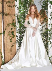 Style #1800L, satin ball gown wedding dress, designed with illusion plunging neckline, low back, and sequined lace embroidery on top, available in ivory